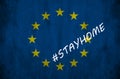 Flag with the stay at home saying