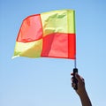 Flag, stop and soccer referee in football match or game wave a foul sign during sport training or workout. Hand, sports Royalty Free Stock Photo