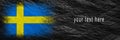 Flag of Sweden. Flag is painted on black crumpled paper. Paper background. Copy space. Textured background Royalty Free Stock Photo