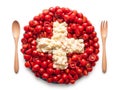 Flag of Switzerland made of tomato and salad