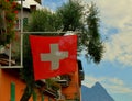 Flag of Switzerland in the village of Gandria. Techino.