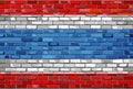 Flag of Thailand on a brick wall