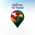 Flag of Togo in shape of map pointer or marker. Welcome to Togo. Vector illustration. Royalty Free Stock Photo