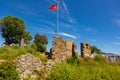 Turkey flag on Naula old city remains Royalty Free Stock Photo