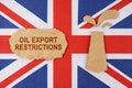 On the flag of UK there is an oil rig cut out of cardboard and a sign with the inscription - oil export restrictions