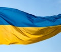 Flag of Ukraine against the blue sky Royalty Free Stock Photo