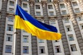 Flag of Ukraine against Cabinet of Ministers of Ukraine building