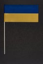 Flag of Ukraine on black background. National symbols of Ukraine. Yellow and blue flag