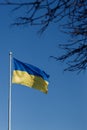 Flag of Ukraine on a clear sky.