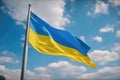 The flag of Ukraine flies high in a clear blue sky, creating a striking image of pride and independence. Generative AI