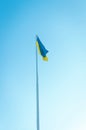 flag of Ukraine on a pole against the sky Royalty Free Stock Photo