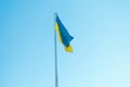 flag of Ukraine on a pole against the sky Royalty Free Stock Photo