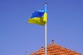 Flag ukrainian National state flag of Ukraine banner on city mat blue sky Royalty Free Stock Photo