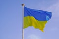 Flag ukrainian National state flag of Ukraine in yellow blue banner summer sky Royalty Free Stock Photo