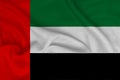 Flag of the United Arab Emirates from the factory knitted fabric. Backgrounds and Textures Royalty Free Stock Photo