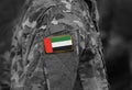 Flag of United Arab Emirates UAE on soldiers arm collage