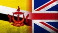 National flag of United Kingdom Great Britain Union Jack with Brunei, the Abode of Peace National flag. Grunge background