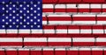 Flag of the United States of America on a brick wall texture Royalty Free Stock Photo