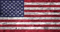 Flag of United States of America over an old brick wall background, surface. USA flag Royalty Free Stock Photo