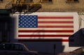 Flag of the United States of America painted onto a grunge brick wall Royalty Free Stock Photo