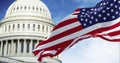 Flag of the United States waving with the American Capitol blurred in the background Royalty Free Stock Photo