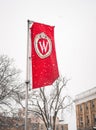 Flag of the University of Wisconsin Madison on a cold winter day