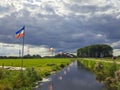 Flag upside down as farmers protest against government measures for nitrogen deposition in Lekkerkerk, the Netherlands