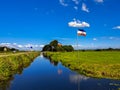 Flag upside down as farmers protest against government measures for nitrogen deposition in Lekkerkerk, the Netherlands