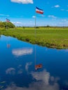 Flag upside down as farmers protest against government measures for nitrogen deposition in Lekkerkerk, the Netherlands