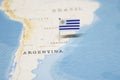 The Flag of uruguay in the world map Royalty Free Stock Photo