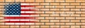 Flag of USA. Flag painted on a brick wall. Brick background. Copy space. Textured background Royalty Free Stock Photo