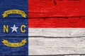 North Carolina State Flag On Old Timber