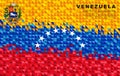 Flag of Venezuela. Abstract background of small triangles in the form of colorful yellow, blue and red stripes of the Venezuelan