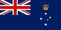 Flag of Victoria Commonwealth of Australia State badge of a Southern Cross surmounted by St Edward`s Crown, on a defaced Britis Royalty Free Stock Photo