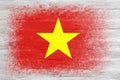 Flag of Vietnam. Flag painted on a white plastered brick wall. Brick background. Copy space. Textured background