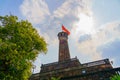 Flag of Vietnam on old tower in Vietnam Military History Museum and OLD QUARTER CITY in HANOI Royalty Free Stock Photo