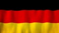 Germany flag waving in the wind. Closeup of realistic German flag with highly detailed fabric texture