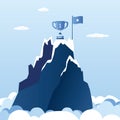 Flag and winner cup on the mountain peak. Way to successful business