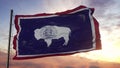 Flag of Wyoming waving in the wind against deep beautiful sky. 3d illustration Royalty Free Stock Photo