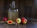 Flagon of Coudy Cider on Dark Wood