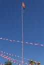 A flagpole with the flag of the Divine Eternal Father.