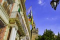 Flags above the entrance to the administrative building of Andalusia. Royalty Free Stock Photo