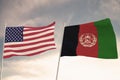 Flags of Afghanistan and United States of America USA waving with cloudy blue sky background, 3D rendering