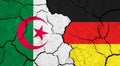 Flags of Algeria and Germany on cracked surface