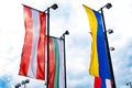 Flags of Austria, Ukraine, Bulgaria against the sky Royalty Free Stock Photo