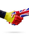 Flags Belgium, United Kingdom countries, partnership friendship handshake concept.