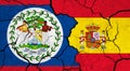 Flags of Belize and Spain on cracked surface
