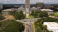 Flags Blow Atop Traffic Below The Capital Dome in Tallahassee Fl