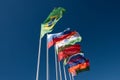 Flags of the BRICS countries in the blue sky