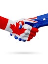 Flags Canada, Australia countries, partnership friendship handshake concept. Royalty Free Stock Photo